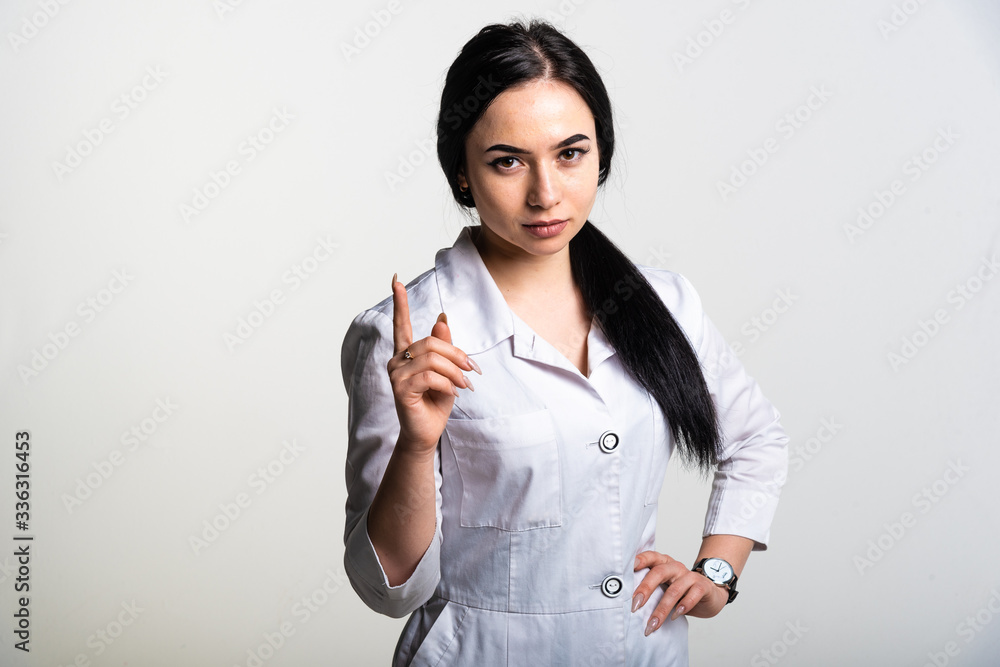 Doctor woman on a light background
Doctor woman on a light background