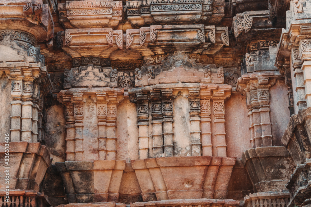 Closeup shot of the carved walls of the temple at Polo Forest in Gujarat, India Closeup shot of the carved walls of the temple at Polo Forest in Gujarat, India