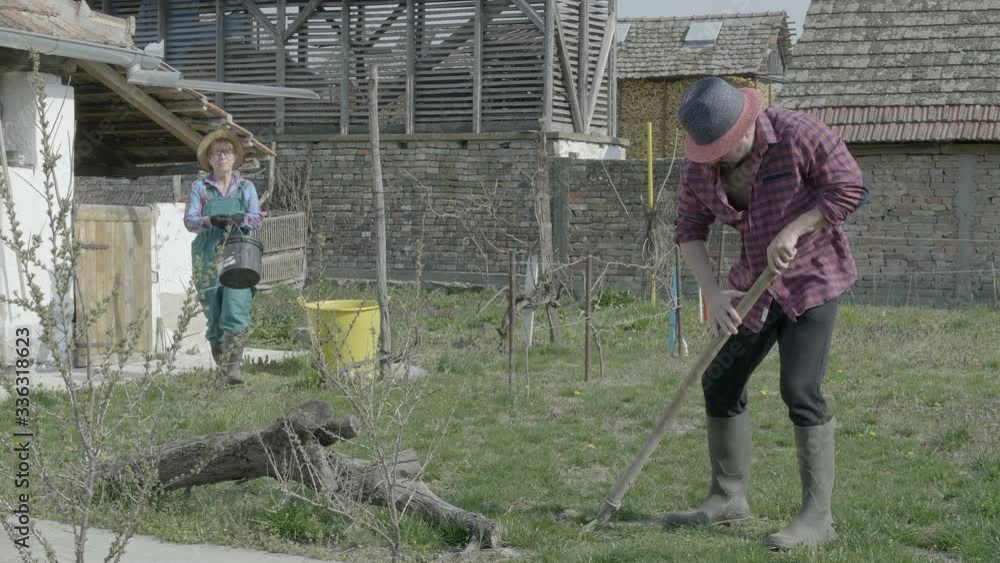 Man and woman doing farming Man and woman doing farming