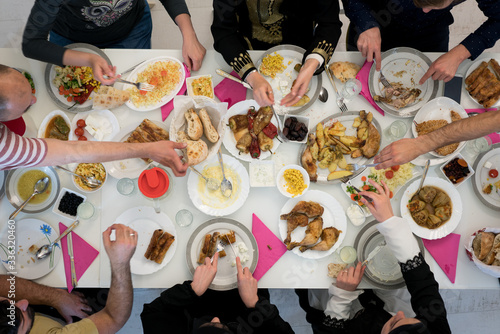 Muslim family gathering for having Iftar in Ramadan together