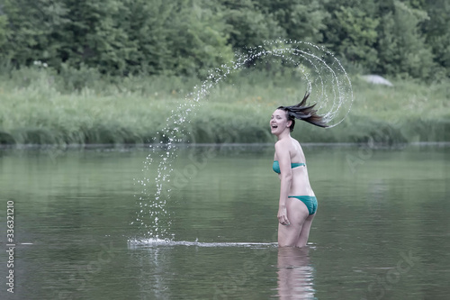 Girl throws water head