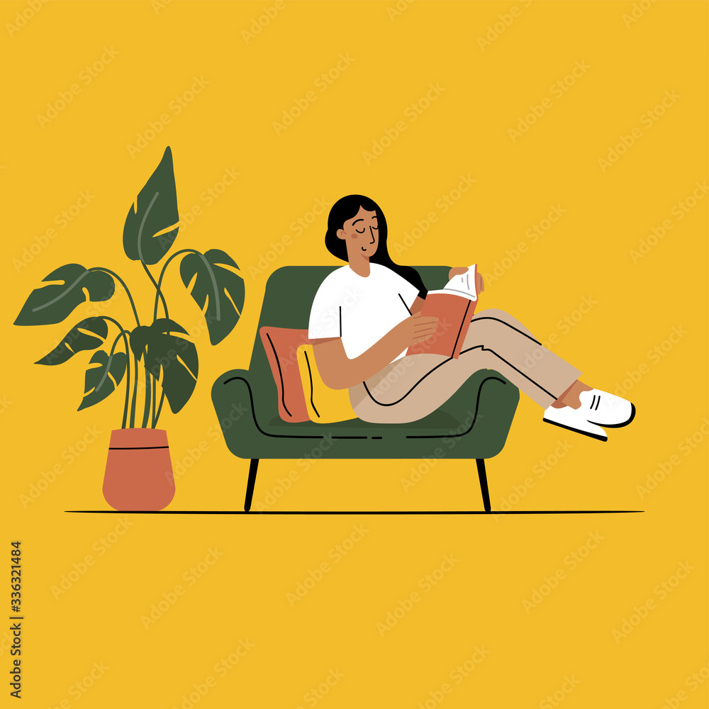 Girl reading a book and resting concept. Woman self isolation in her home Girl reading a book and resting concept. Woman self isolation in her home