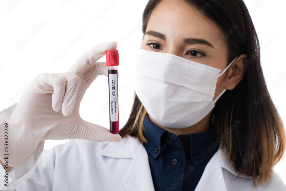 Doctor holding tube of corona virus Doctor holding tube of corona virus