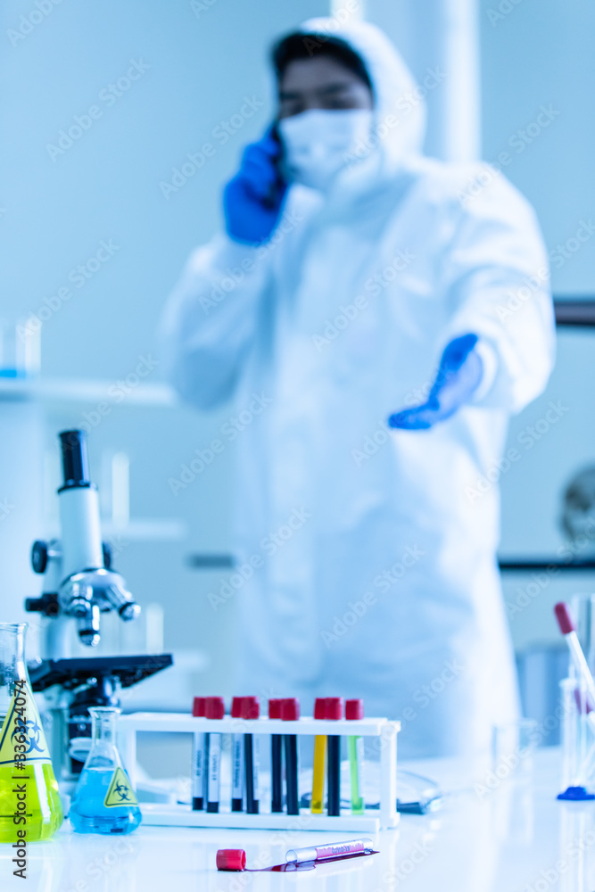 Fototapeta premium Scientist break the blood tube broken.