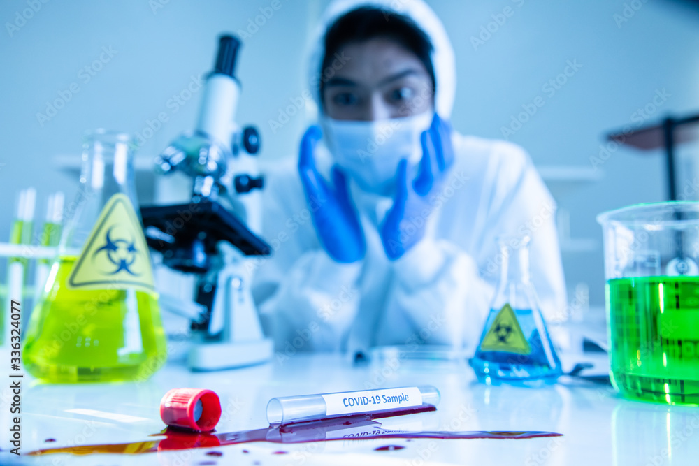 Scientist break the blood tube broken. Scientist break the blood tube broken.
