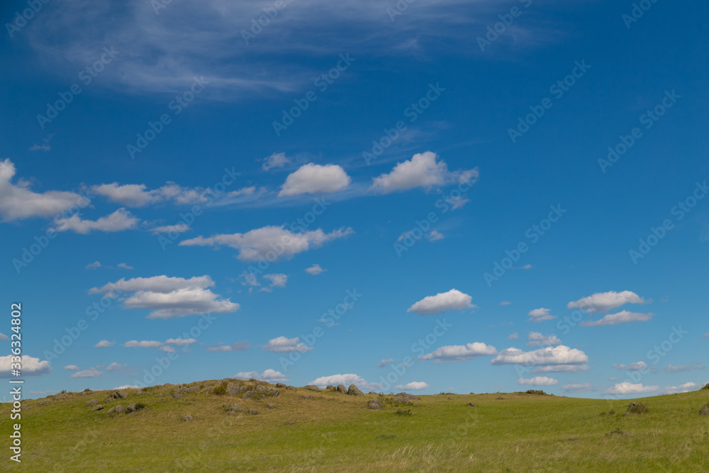 Obraz premium blue sky with Cumulus clouds, field (steppe)