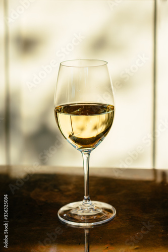 Glass of white wine outdoors