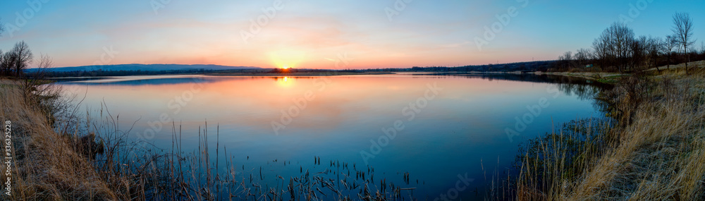 Panorama lake view in sunrise time /Sunrise at the lake - obrazy, fototapety, plakaty 