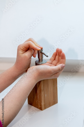 Children washing their hands to prevent illness