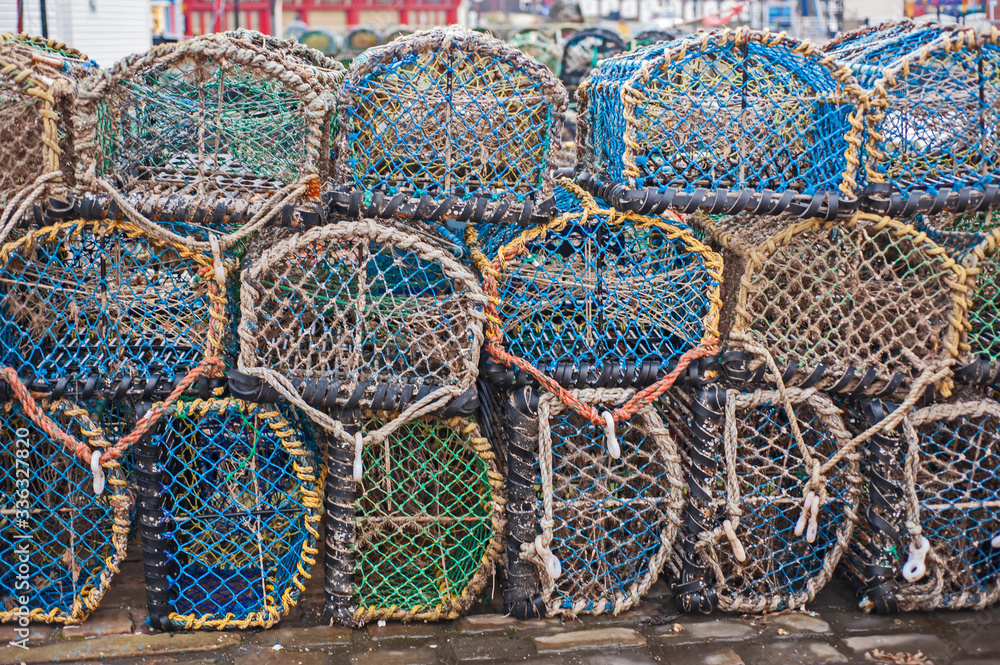 Lobster pots on a harbor quayside Lobster pots on a harbor quayside