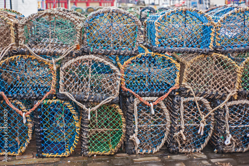 Lobster pots on a harbor quayside
