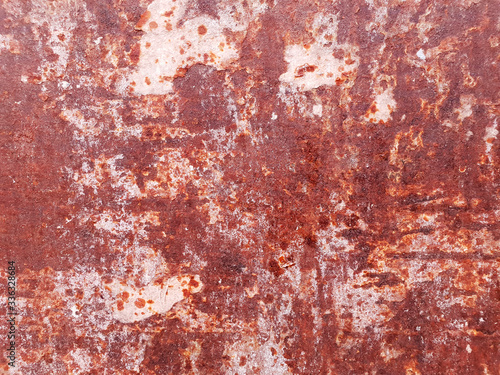 Rusty iron background. Iron texture on the Wallpaper. © Tanya