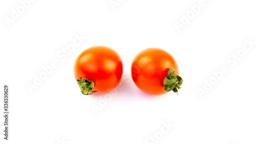 small red tomatoes on a white background isolate