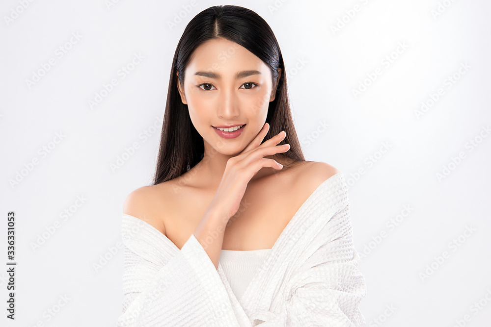 Beautiful Young Asian Woman with Clean Fresh Skin. Face care, Facial treatment, Cosmetology, beauty and healthy skin and cosmetic concept, woman beauty skin isolated on white background Beautiful Young Asian Woman with Clean Fresh Skin. Face care, Facial treatment, Cosmetology, beauty and healthy skin and cosmetic concept, woman beauty skin isolated on white background