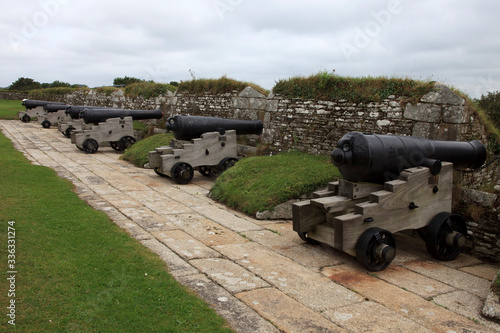 Falmouth (England), UK - August 15, 2015: Cannon near Pendennis castle, Falmouth, Cornwall, England, United Kingdom. photo