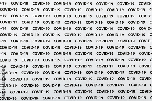 Black plain text on white paper about coronavirus outbreak. Covid-19.