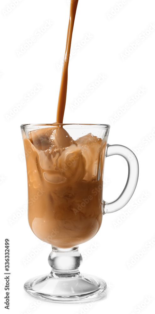 Pouring of coffee into in glass cup with ice cubes on white background Pouring of coffee into in glass cup with ice cubes on white background