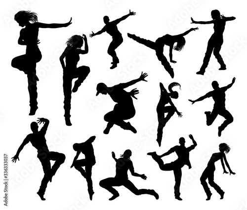 A set of men and women street dance hip hop dancers in silhouette