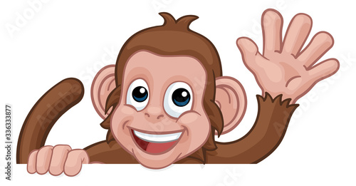 A monkey cartoon character animal peeking over a sign and waving