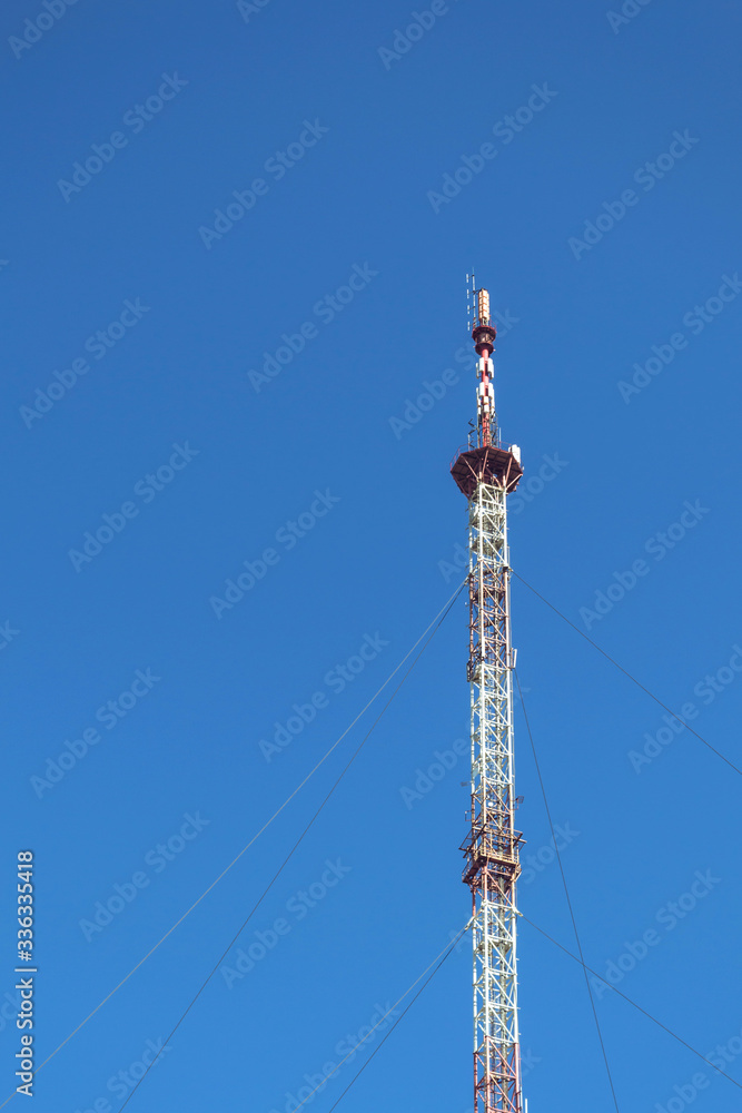 Obraz premium Tower for cellular communication and data transmission. Mobile phone Telecommunication Radio antenna Tower.