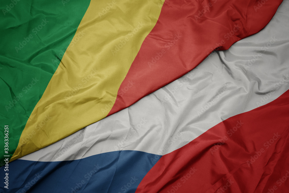 waving colorful flag of czech republic and national flag of republic of the congo.