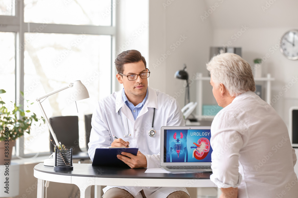 Senior man visiting urologist in clinic Senior man visiting urologist in clinic