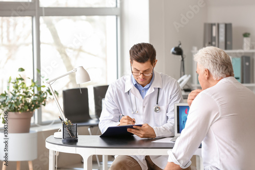 Senior man visiting urologi...