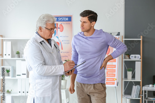 Young man visiting urologis...