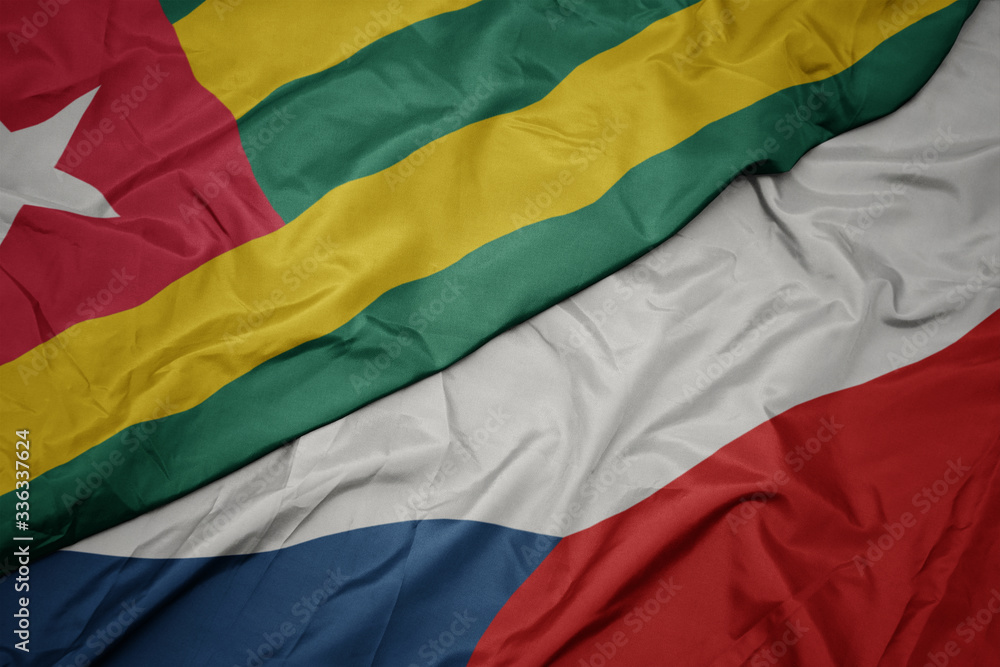 waving colorful flag of czech republic and national flag of togo.