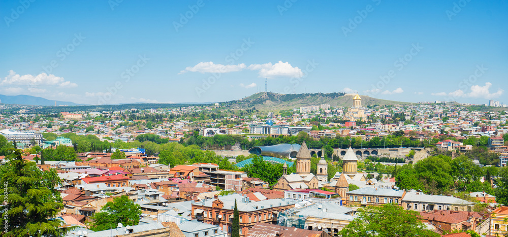 Panoramic view of Tbilisi city from the Narikala Fortress, old town and modern architecture.  Georgia.