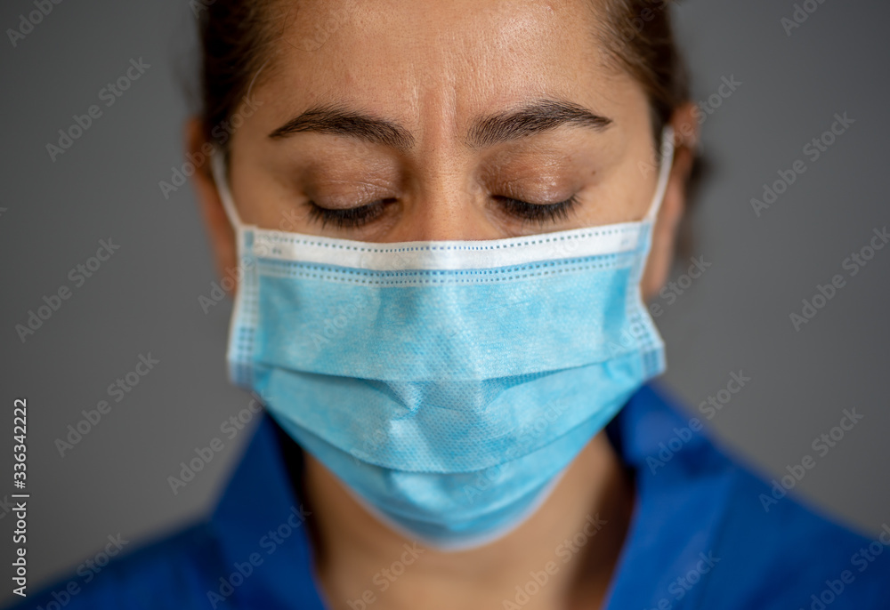 Female Doctor or Nurse Wearing Protective face medical Mask. Save lives from Covid-19 Outbreak Female Doctor or Nurse Wearing Protective face medical Mask. Save lives from Covid-19 Outbreak