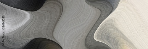 abstract flowing designed horizontal banner with gray gray, light gray and very dark blue colors. fluid curved flowing waves and curves