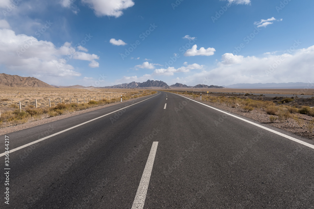 Gobi desert road on vast dry wilderness