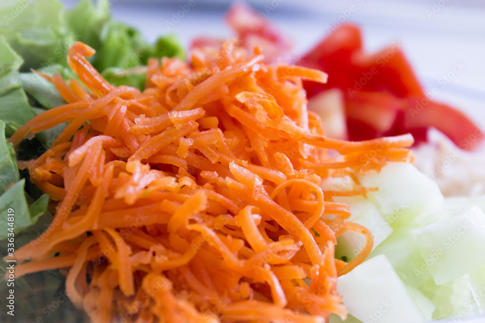 Lettuce, carrot, cucumber, tomato and onion salad Lettuce, carrot, cucumber, tomato and onion salad