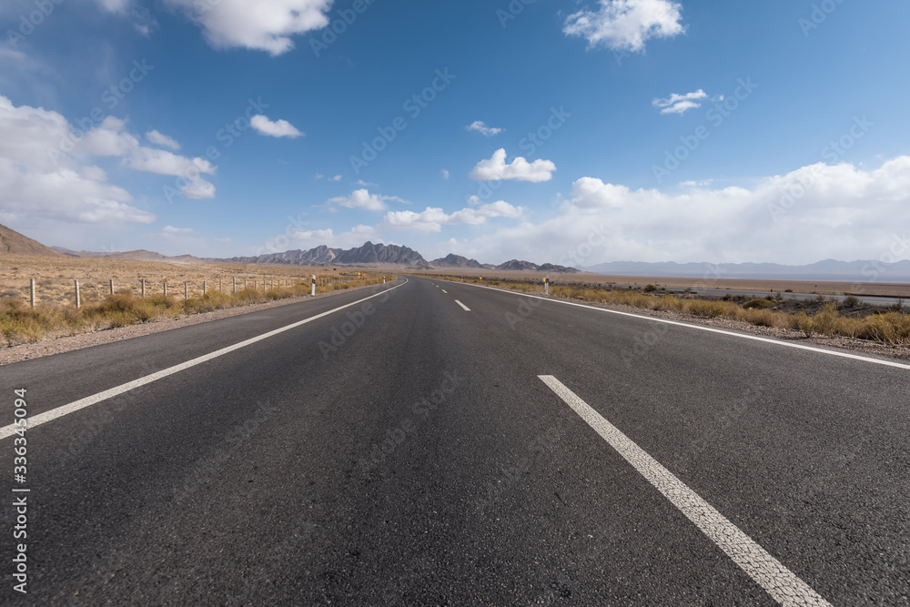 Gobi desert road on vast dry wilderness Gobi desert road on vast dry wilderness