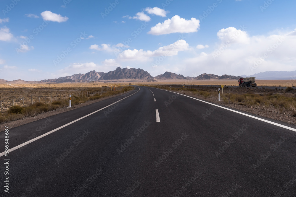 Gobi desert road on vast dry wilderness