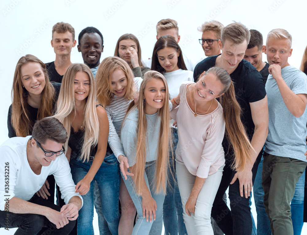 group of cheerful young people looking at the camera.