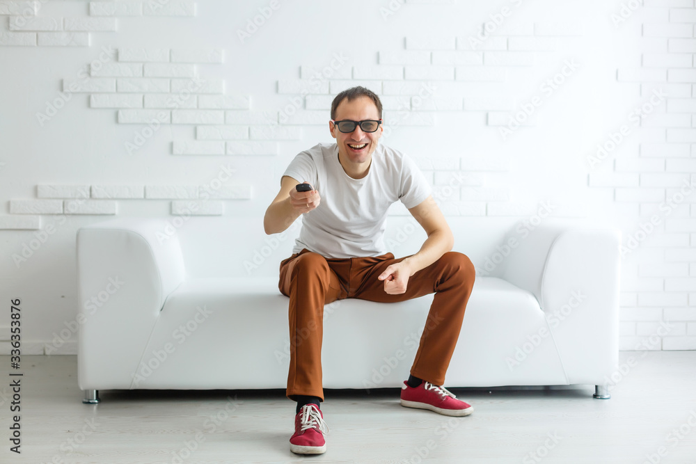 Obraz premium Mature Man On Couch Watching Television