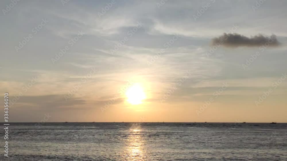 A focused shot of a beautiful sun setting over the sea in fort kochi, with clear skies and low tides. A focused shot of a beautiful sun setting over the sea in fort kochi, with clear skies and low tides.