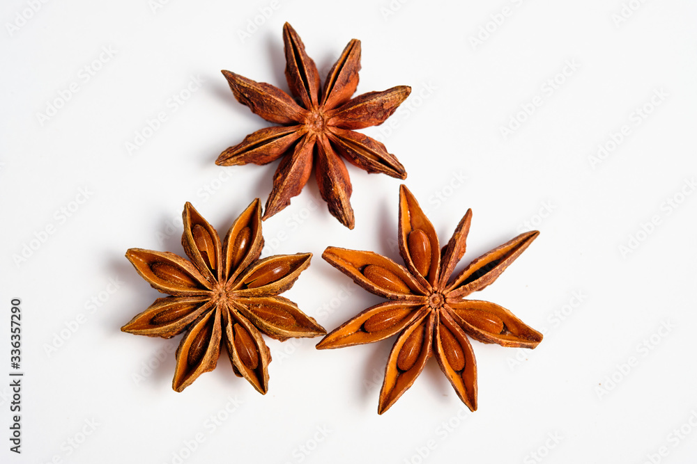 Anise stars, Badian on a white background, space for text,lat lay.