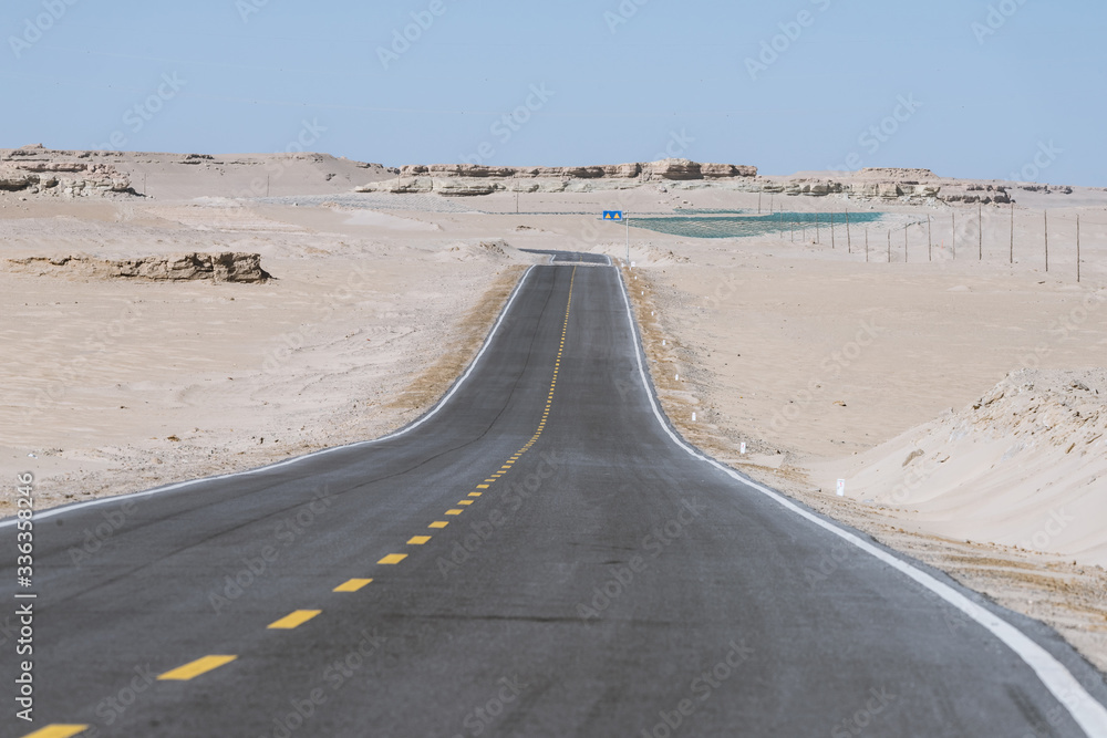 Fototapeta premium Gobi desert road on vast dry wilderness