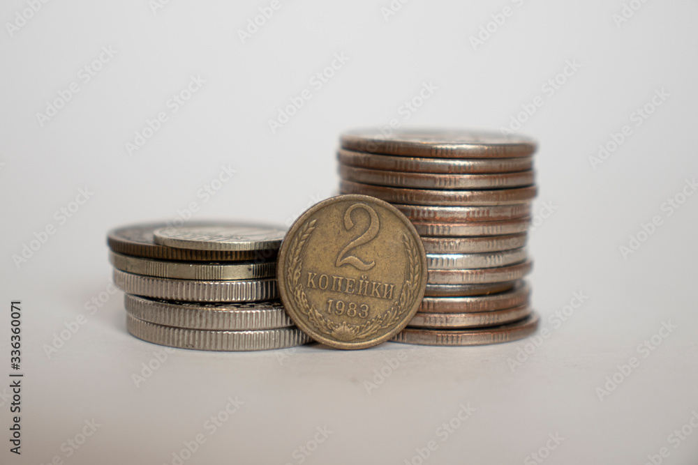 coin worth two pennies of the ussr. Coin stands vertically near other coins piled in a stack coin worth two pennies of the ussr. Coin stands vertically near other coins piled in a stack