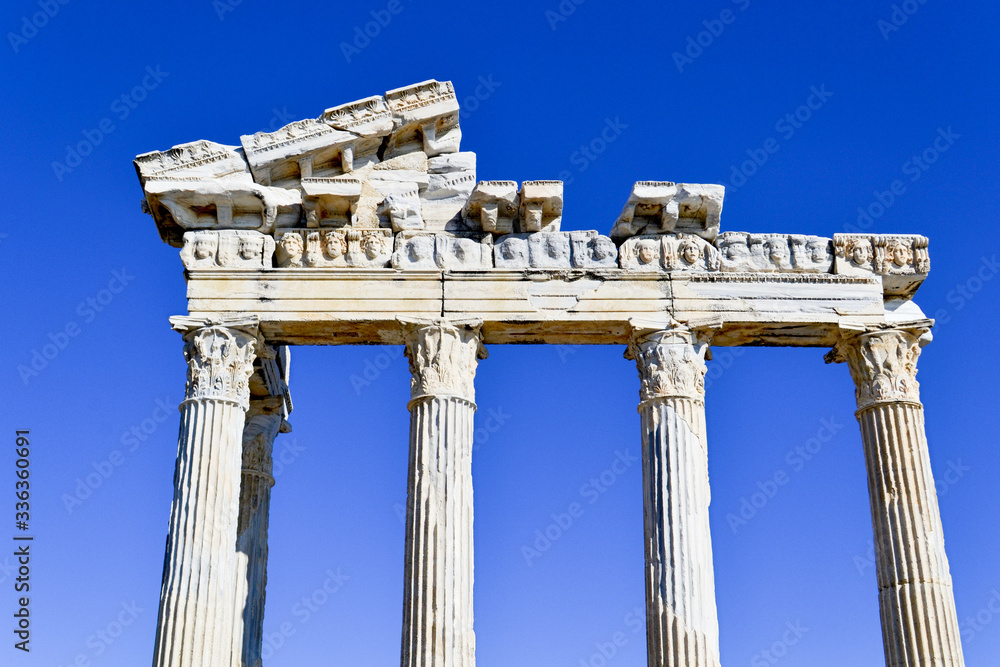 Temple of Apollo in the Old city of side, antique columns against the blue sky