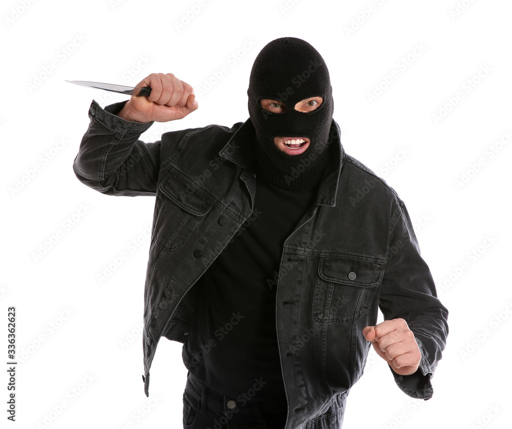 Man in mask with knife on white background. Dangerous criminal Man in mask with knife on white background. Dangerous criminal