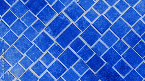 Abstract dark phantom blue concrete cement stone square rectangular cubes texture background ( 45 degrees )