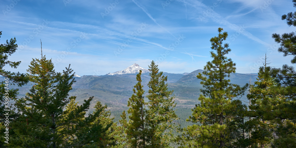 Mountain forest panoramic view from Green Ridge in central Oregon with the Mt Jefferson at background. Mountain forest panoramic view from Green Ridge in central Oregon with the Mt Jefferson at background.