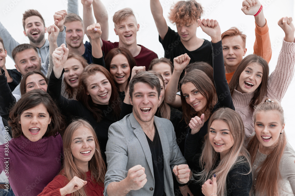 close up. happy young people showing their success close up. happy young people showing their success