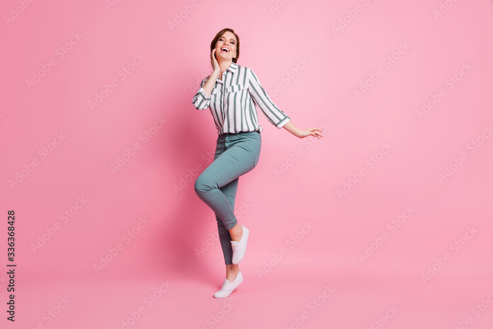Full size photo of cheerful content girl have fun on spring holidays with friends feel coquette laugh boyfriends joke wear modern clothing isolated over pastel color background Full size photo of cheerful content girl have fun on spring holidays with friends feel coquette laugh boyfriends joke wear modern clothing isolated over pastel color background