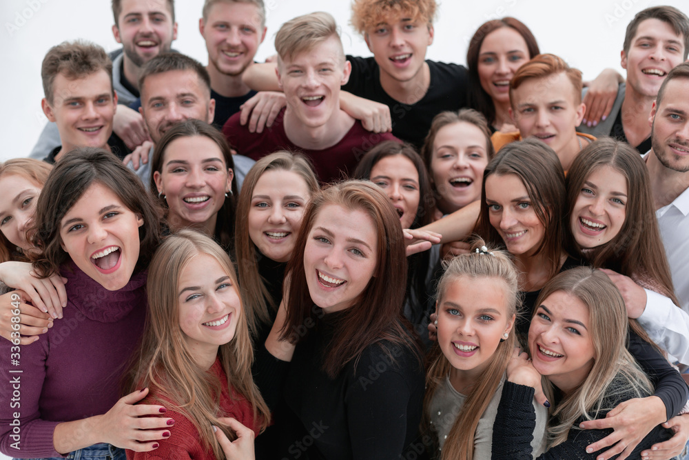 large group of friends with a smile looking at the camera large group of friends with a smile looking at the camera