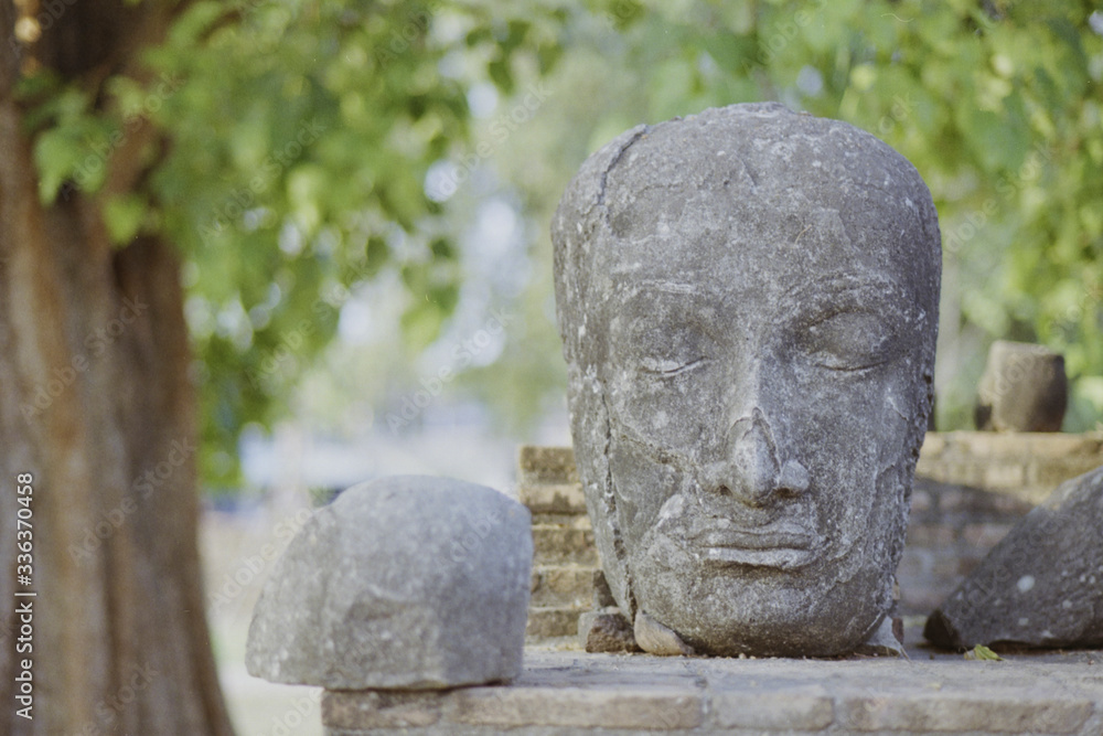 Ruin of buddha statue in Thailand